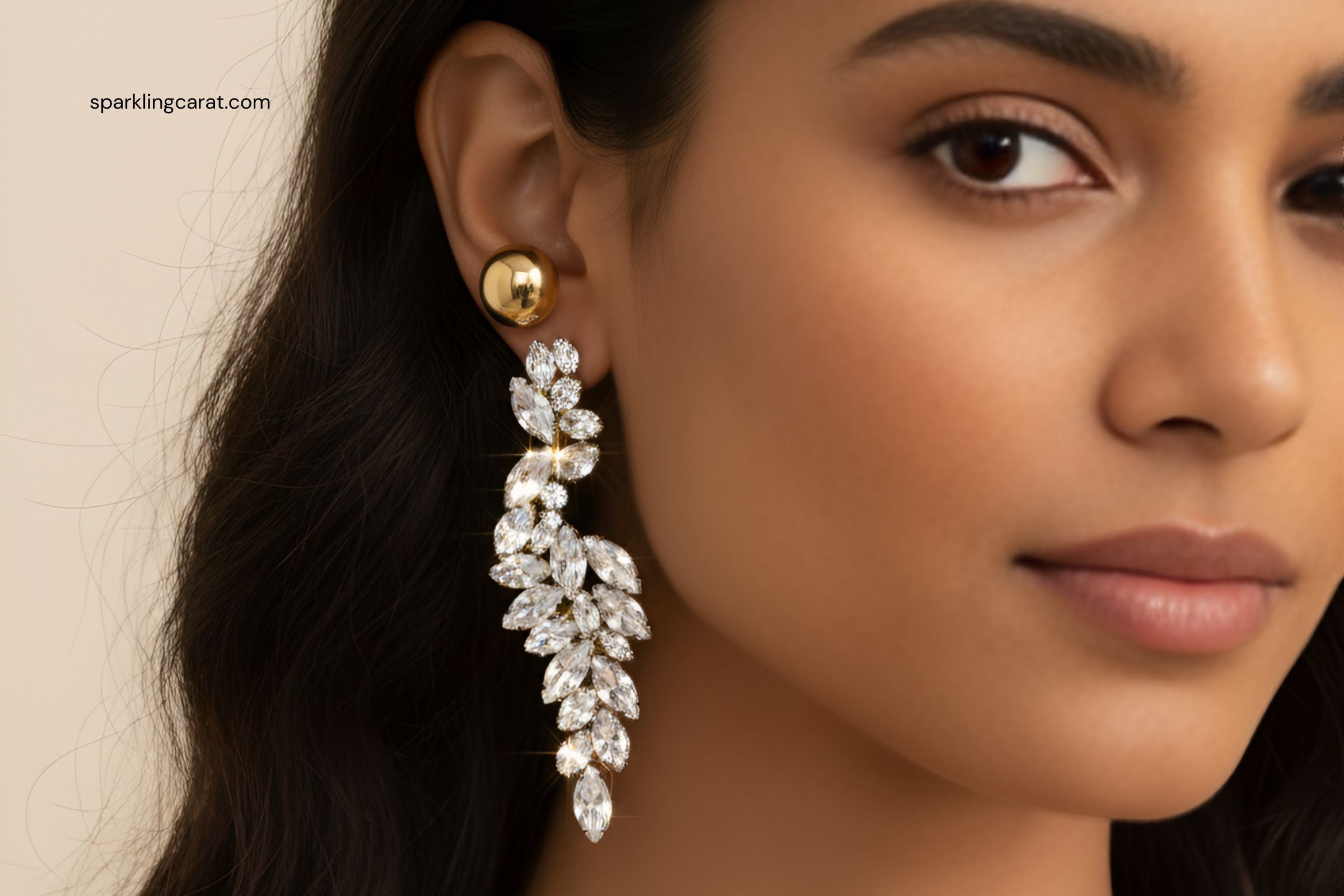 Model showcasing mismatched earrings and asymmetry trend in jewelry 2025.